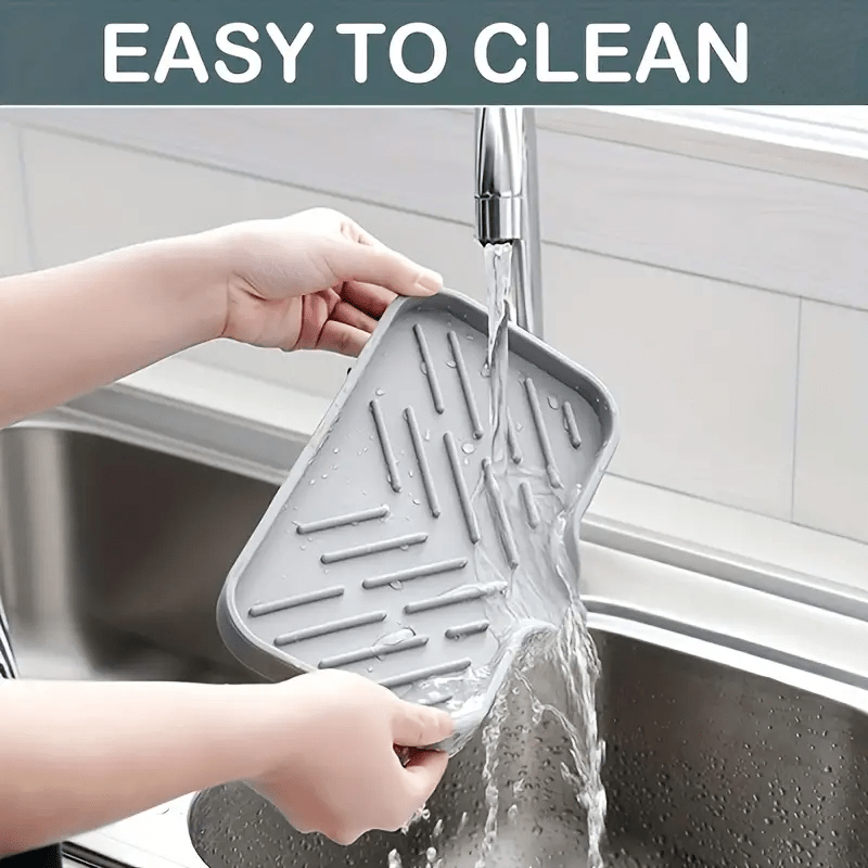 Quick-drying anti-slip mat for kitchen and bathroom with drain spout