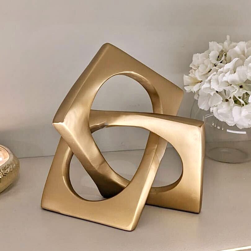 Gouden decoratieve knoop sculptuur | Tijdloze elegantie voor uw interieur