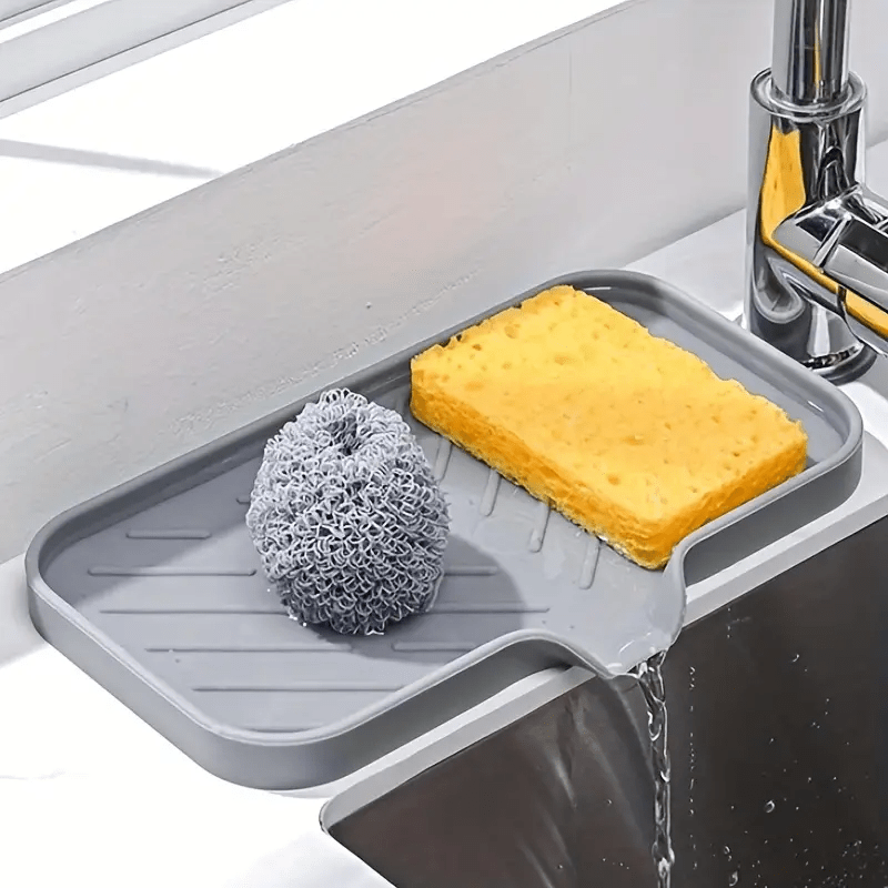Quick-drying anti-slip mat for kitchen and bathroom with drain spout