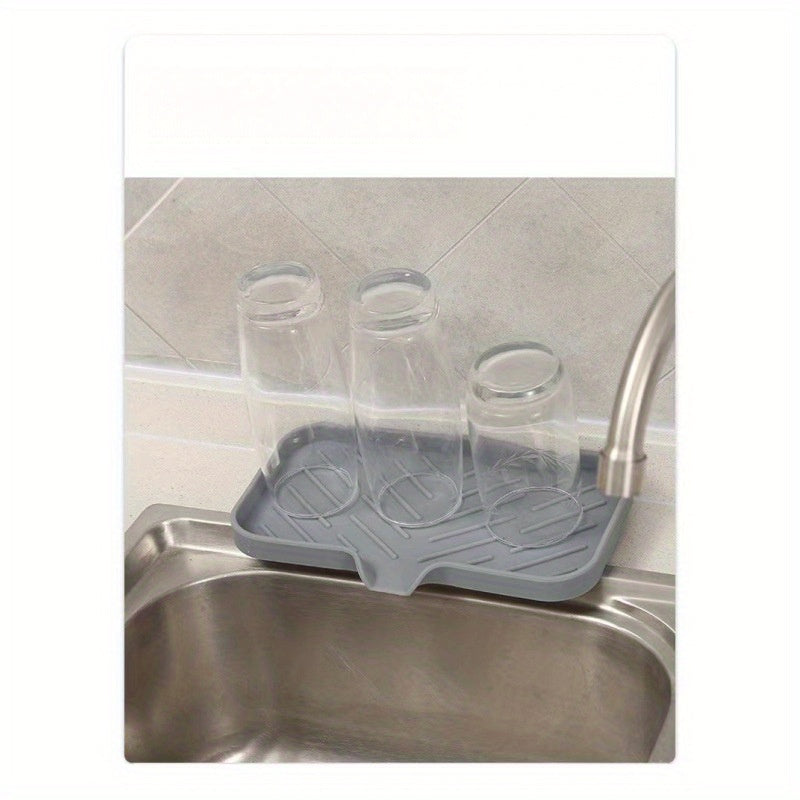 Quick-drying anti-slip mat for kitchen and bathroom with drain spout